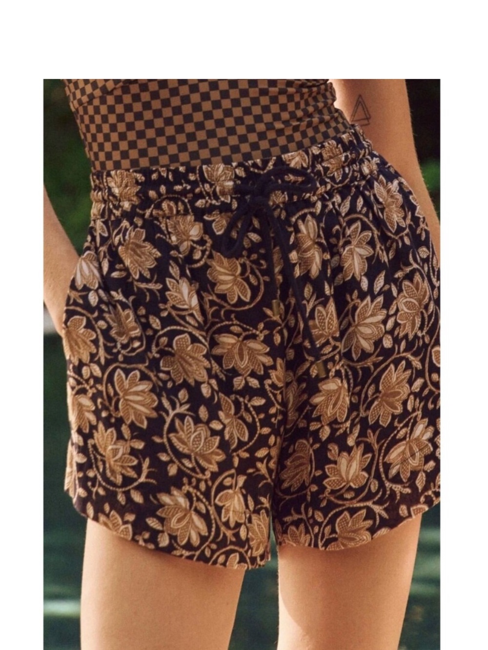 THE GREAT. The DeltaBlack Shorts with Tan Floral Print